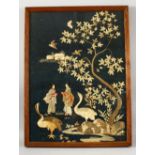 AN EARLY 20TH CENTURY CHINESE SILK EMBROIDERED PICTURE, depicting a pair of figures and geese