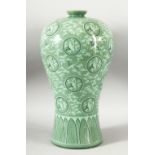 A LARGE KOREAN CELADON PORCELAIN VASE, decorated with roundels of flying cranes, the base with mark,
