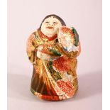 A JAPANESE MEIJI PERIOD SATSUMA BOX & COVER IN THE FORM OF A BOY - the boy looking up, the base