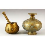 A 17TH/18TH CENTURY MUGHAL BRASS PESTLE AND MORTAR, together with an engraved and chased brass