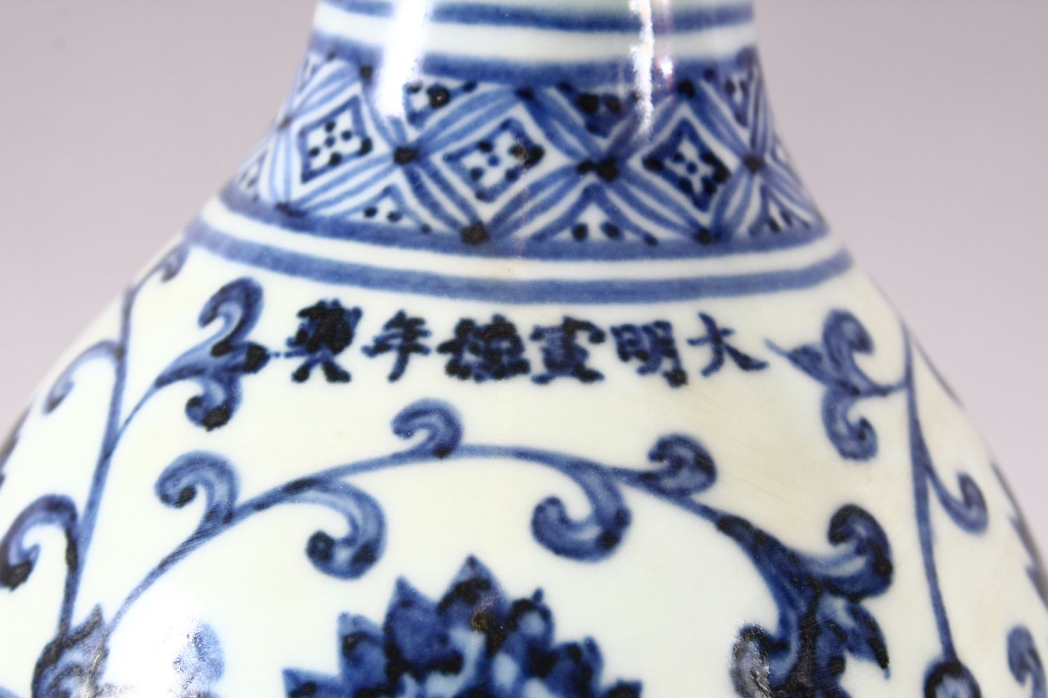 A CHINESE BLUE AND WHITE DOUBLE GOURD VASE, painted with lotus flowers, six character mark to rim, - Image 5 of 7