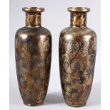 A PAIR OF UNUSUAL CHINESE METALLIC GLAZE PORCELAIN VASES, the bases with blue four character mark,