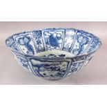 A GOOD LARGE CHINESE WANLI BLUE & WHITE PORCELAIN BOWL - with decoration in panels of flora and