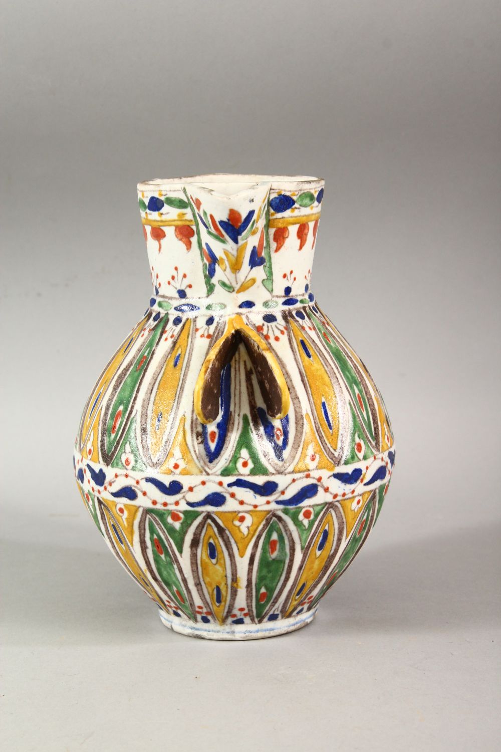 A TURKISH OTTOMAN KUTAHYA POTTERY POT - the body with multi coloured leaf shaped tendril with a - Image 2 of 6