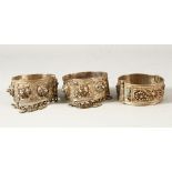 THREE 19TH CENTURY OTTOMAN BALKANS SILVER BANGLES, inset with turquoise stones, each approx. 6cm