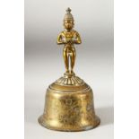 A LARGE INDIAN GILT BRONZE TEMPLE BELL, the bell with engraved and chased decoration depicting