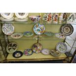 A continental porcelain and pottery plates and dishes.