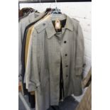 A ladies' Burberry grey and blue check raincoat.