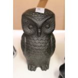 A cast iron model of an owl.