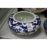 A Chinese blue and white circular porcelain brush washer or censer.