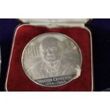 A cast silver Winston Churchill commemorative medallion, boxed.