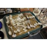 A large quantity of plated flatware and boxed flatware.