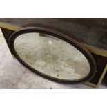 An oval mirror.