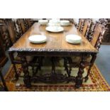 A good and impressive continental carved walnut rectangular dining table with barley twist legs
