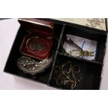 A small collection of gold and other rings, two ladies' wristwatches, an evening purse etc.