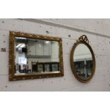 Two gilt framed mirrors.