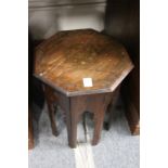 An eastern brass inlaid octagonal occasional table.