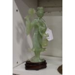 A Chinese carved jadeite figure of a Geisha.