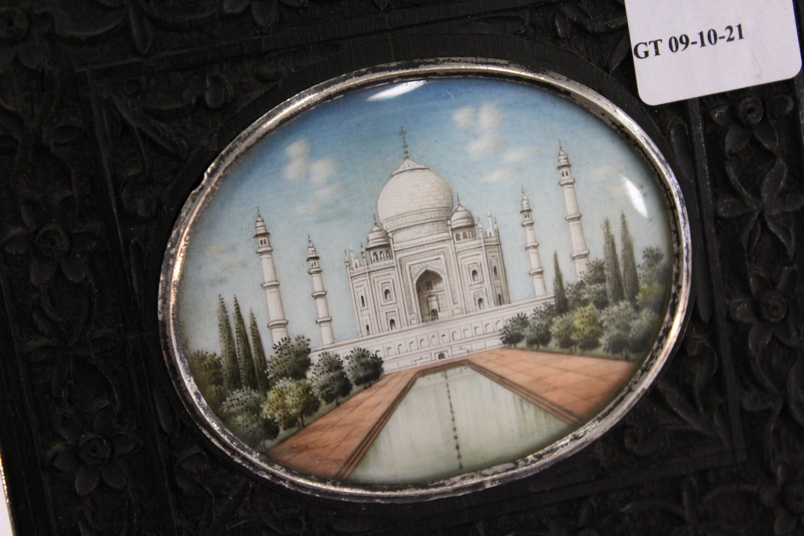 An Indian miniature painting in a carved ebony frame. - Image 2 of 2