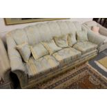 A classical style upholstered settee.