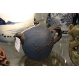 A Chinese blue ground Yixing teapot.