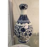 A Chinese blue and white garlic neck vase.