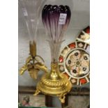 An amethyst tinted tulip shaped glass vase with ormolu base.