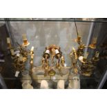 A collection of ormolu light fittings.