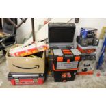 A large quantity of various tools and storage cases.