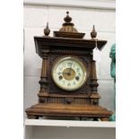 A good walnut cased mantle clock.