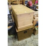 A pine blanket box and a plywood chest.