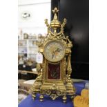 An ormolu mantle clock.