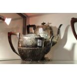 A Victorian silver teapot and matching coffee pot.