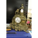 An ormolu mantle clock.