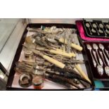 A good collection of silver and other items to include grape scissors, teaspoons, button hooks