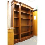 A Sheraton revival inlaid mahogany standing breakfront open bookcase.