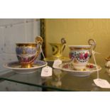 Three decorative Berlin cups and saucers.