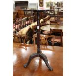 A Chippendale style mahogany tripod table or urn stand.