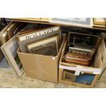 A large quantity of assorted paintings and prints.