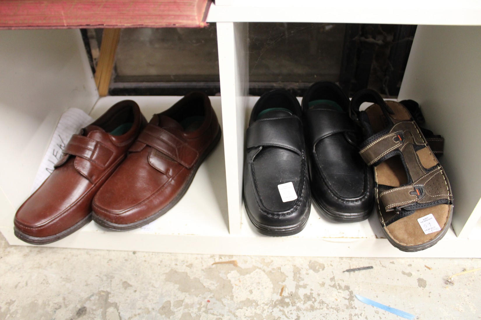 Two new pairs of gentlemen's size 11 shoes and a pair of sandals.