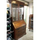 A mahogany bureau bookcase.