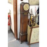 An oak cased grandmother clock.