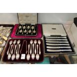 A good cased set of twelve silver coffee spoons with matching sugar tongs, a cased set of silver