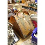 A Victorian brass bound oak coal box.