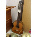 A classical guitar.