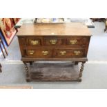An unusual 18th century small oak pot board style dresser with an arrangement of five drawers on