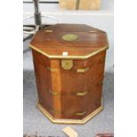 A brass bound octagonal shaped storage box.