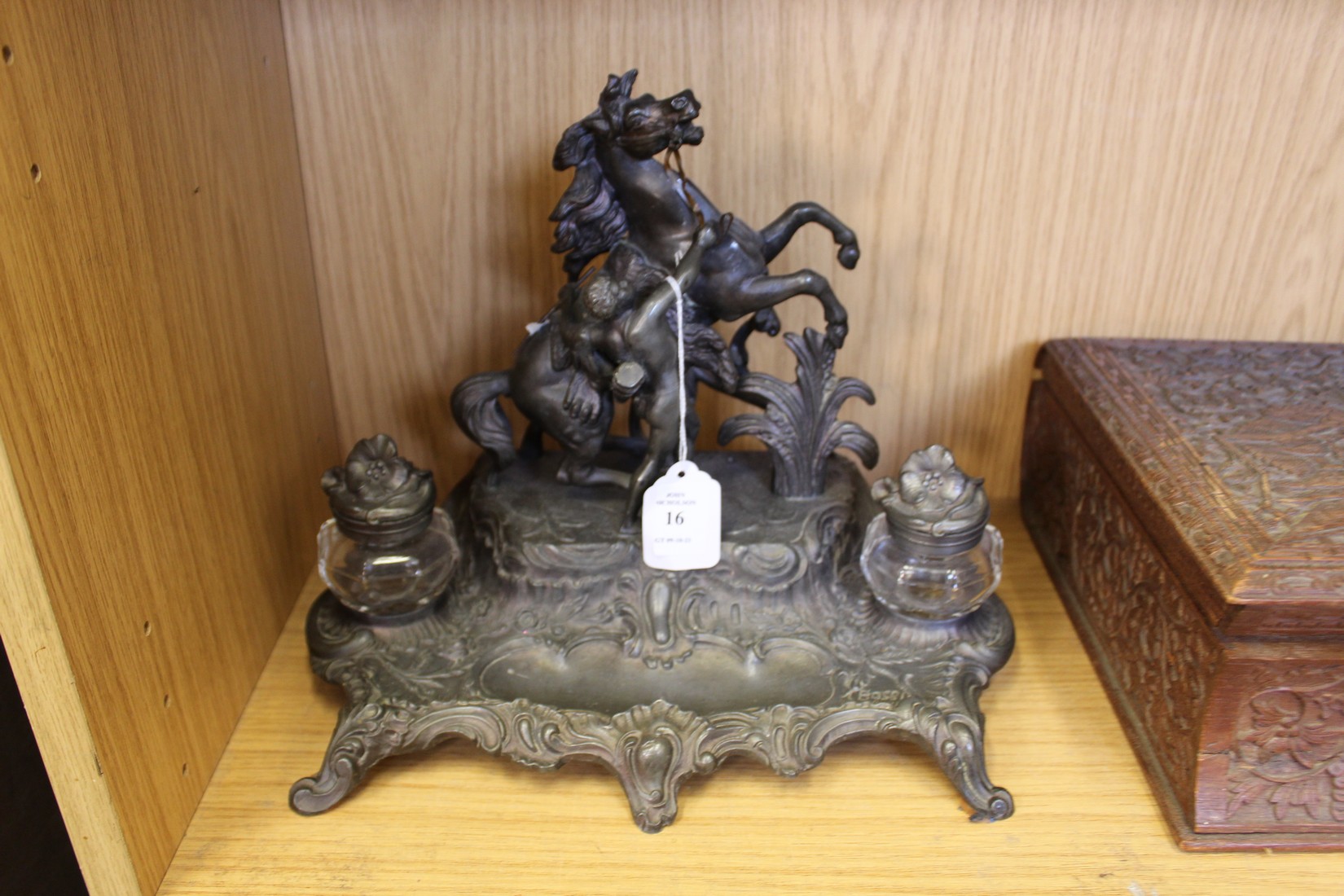 A spelter desk stand with a Marley horse style mount.