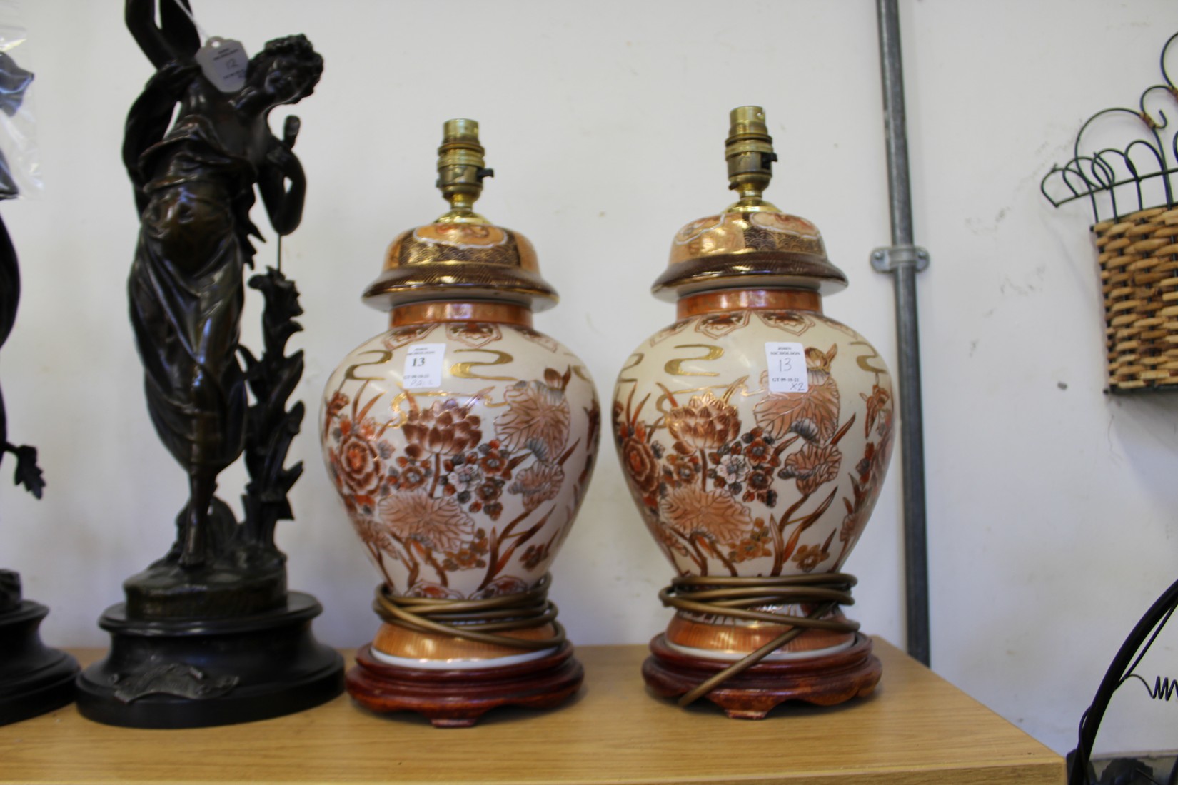 A pair of Chinese ginger jar style lamps.