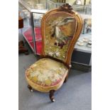 A good Victorian spoon back bedroom chair with needlework and beadwork upholstered back and seat.